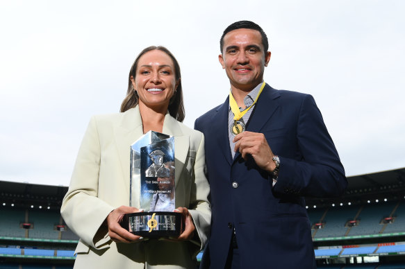 Kyah Simon of the Matildas poses with the Don Award, and Socceroos great Tim Cahill poses with his medal after being inducted into the Sport Australia Hall of Fame at a ceremony at the MCG on Friday.