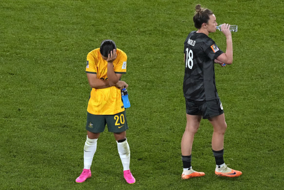 So close ... Sam Kerr and Mackenzie Arnold after the final whistle on Wednesday night.