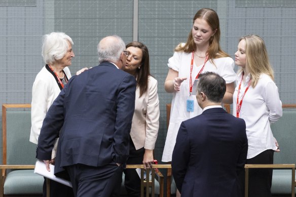 Former Prime Minister Scott Morrison with his mother Marion, wife Jenny and daughters Lily and Abbey after his valedictory speech, at Parliament House in Canberra on Tuesday 