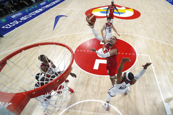 Canada’s Dillon Brooks drives to the basket against the USA’s Josh Hart in the bronze-medal play-off.
