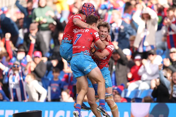 The Knights celebrate a try on Sunday.
