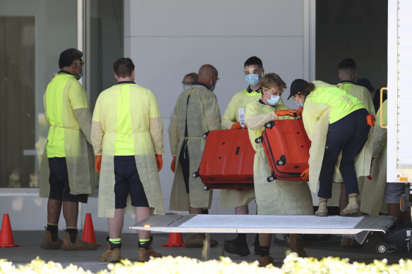 Stranded Australians brought home on a repatriation flight arriving at Canberra airport last November. 