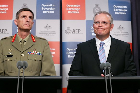 Former immigration minister Scott Morrison in 2014 with Lieutenant-General Angus Campbell. 