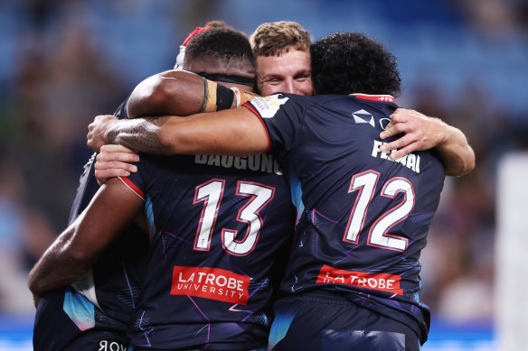 Rebels players celebrate a win at Allianz Stadium in Sydney in March.