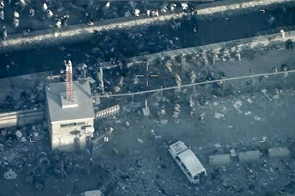 US Marines around the scene at Abbey Gate on August 26, 2021,  after a suicide bomber detonated an explosion.  