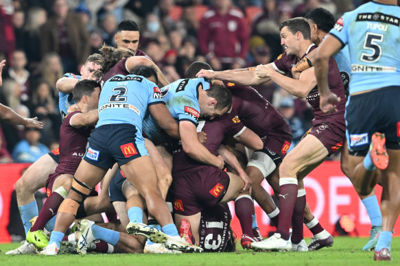 A brawl erupts after Matt Burton and Dane Gagai exchanged punches in the series decider in 2022.