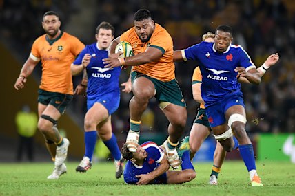 Replacement prop Taniela Tupou makes a ferocious charge late in the match.