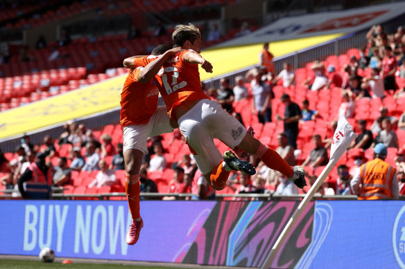 Kenny Dougall celebrates one of his playoff goals at Wembley.
