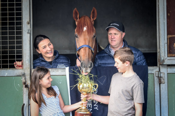 Melbourne Cup winner Vow And Declare with with trainer Danny O'Brien, his wife Nina, and children Thomas and Grace on Wednesday.