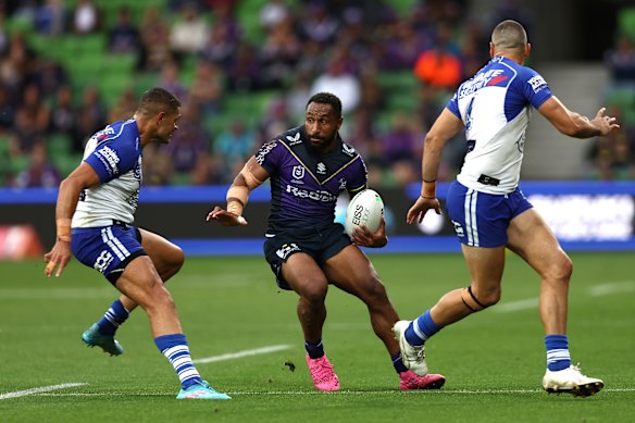 Melbourne center Justin Olam tries to get past Canterbury’s defence.