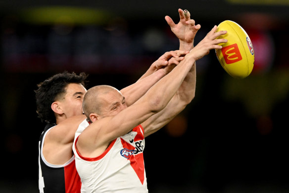 Sam Reid leaps for a mark.