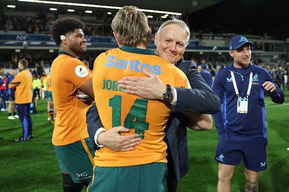 Schmidt hugs Max Jorgensen after the Italy Test.