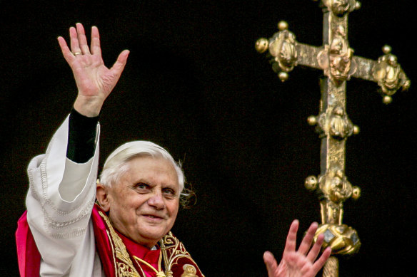 Pope Benedict XVI greets the crowd from the central balcony of St. Peter’s Basilica at the Vatican soon after his election on April 19, 2005.