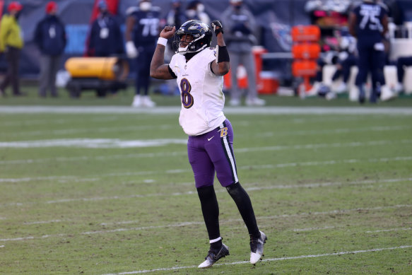 Ravens quarterback Lamar Jackson celebrates victory over the Titans.