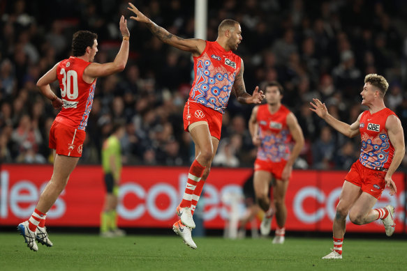 Lance Franklin celebrates a goal.