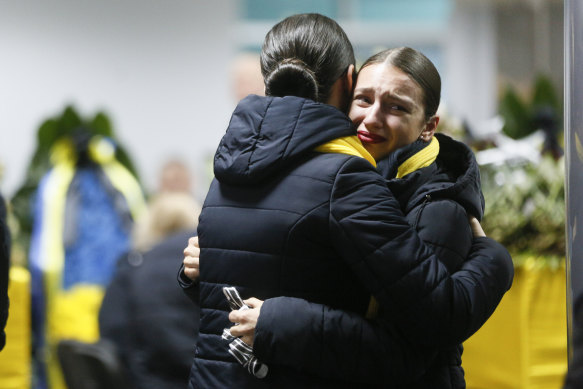 Ukrainian Airlines flight attendants grieve for the victims of the disaster.
