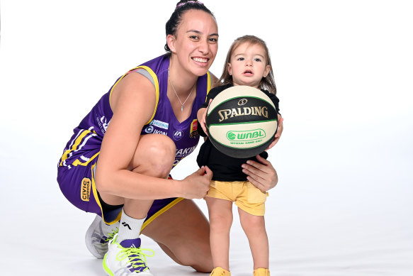 Melbourne Boomers' Ashleigh Karaitiana with her daughter Kalea.