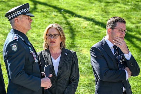 Mike Bush with former premier Jacinta Allan and former police minister Anthony Carbines.