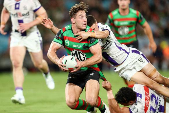 Cameron Murray looks to make a break through the Melbourne defence.