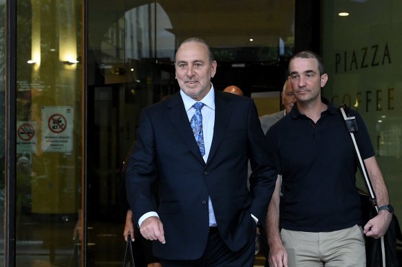 Hillsong founder Brian Houston (left) leaves Downing Centre Local Court on Monday.
