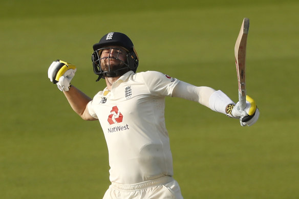 Chris Woakes celebrates England victory.