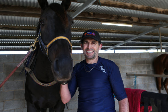 Mornington trainer Brett Scott has been placed in an induced coma after being kicked by a horse on Wednesday.