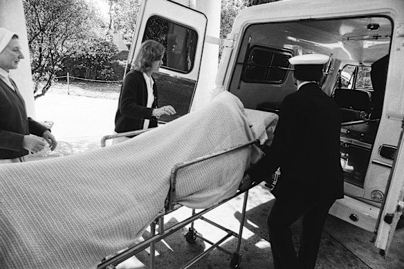 Dietrich leaving Sydney’s St Vincent’s Hospital in a protective body cast for the flight back to Los Angeles.