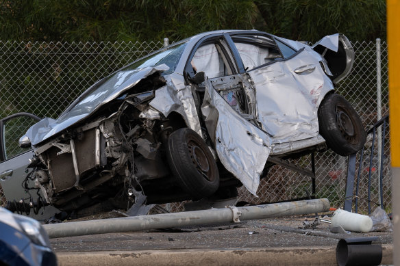 The carnage saw one car end up crumpled on the footpath. 