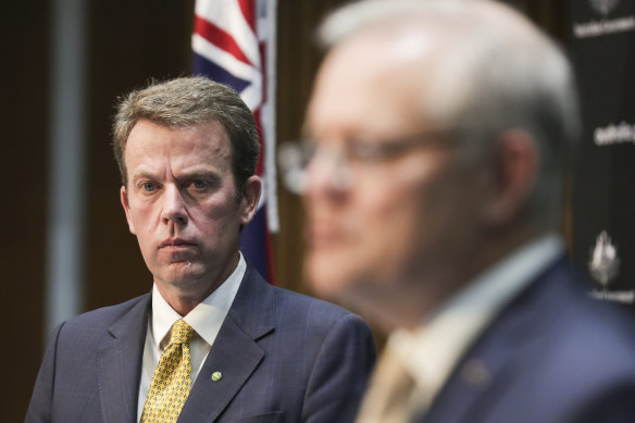 Pressure points: Federal Education Minister Dan Tehan  with Prime Minister Scott Morrison at a press conference last month.