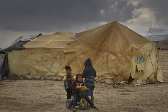 Children gather in the foreign section of the al-Hawl camp in north-east Syria.