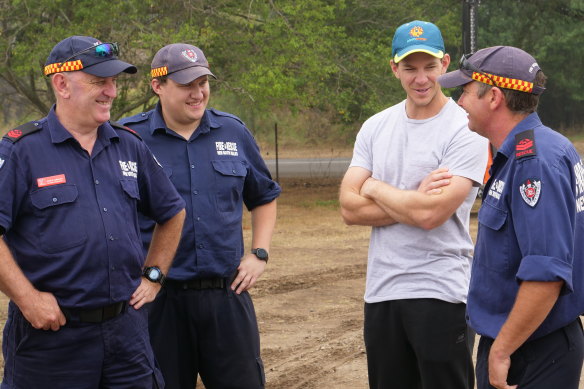 "It's been a really special day for us": Paine chats to NSW Fire and Rescue workers.