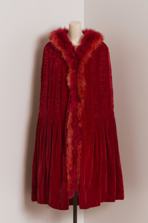 The red velvet and marabou feather cape recently acquired by the NGV will be one of the features of the exhibition. 