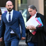 Sewell, middle, arrives at the appeal hearing with he partner and barrister Dermot Dann, KC.