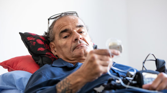 Adam Young with his spinal cord stimulator.