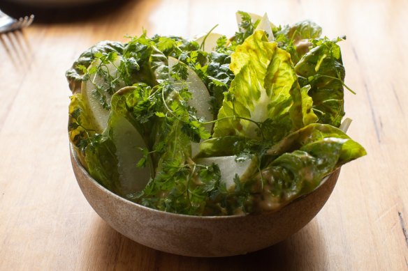 Cos lettuce salad dressed in curried egg is a bowl of crispness and creaminess.