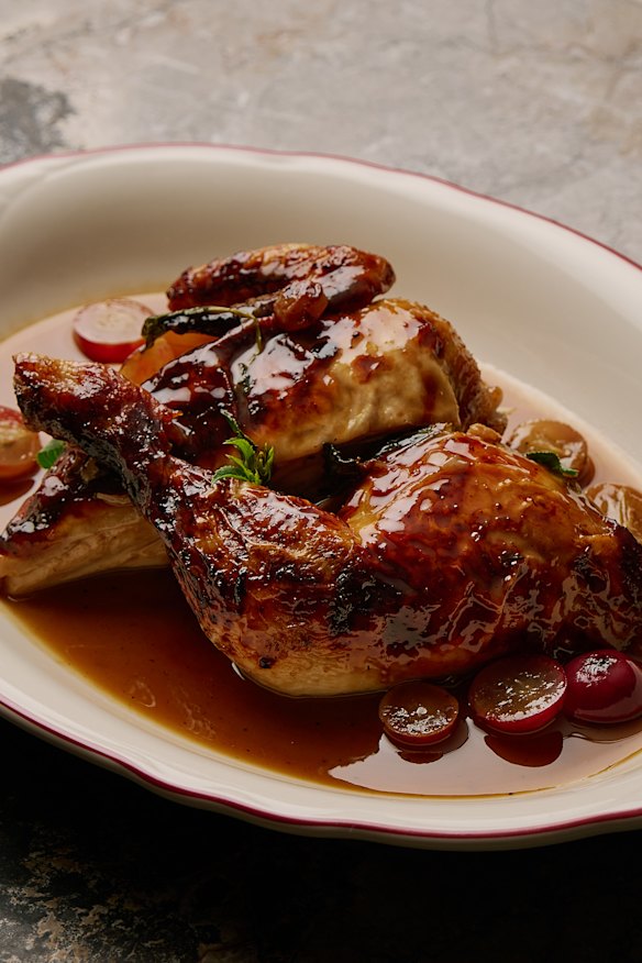 Wood-fire oven roasted half chook with blistered grapes and a salty-sweet agrodolce-like sauce.
