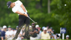 Xander Schauffele hits from the fairway on the eighth hole during the first round of the PGA Championship. 