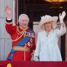 Prince George, Prince William, Prince Louis, Princess Charlotte, Princess Catherine, King Charles and Queen Camilla wave from the Buckingham Palace balcony.