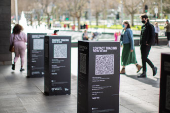 Melburnians check in to the NGV via the QR code system.