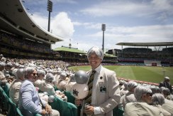 Richie Benaud fan club co-founder Steve Blacker stands by the Richie lookalikes at SCG for the second day of the third Ashes Test v England.