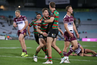 Cameron Murray of the Rabbitohs celebrates scoring a try.
