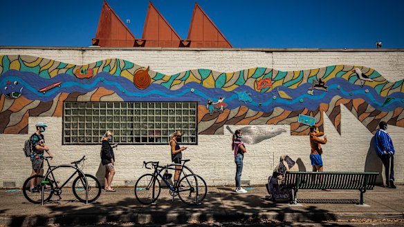 People lining up for a COVID-19 test at Collingwood earlier this week. 