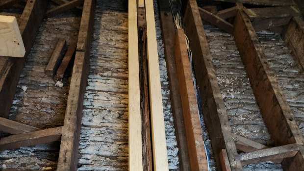 Repairs undertaken by Nathan Kulinitsch to brace a termite-damaged beam in his house in Dawes Point.