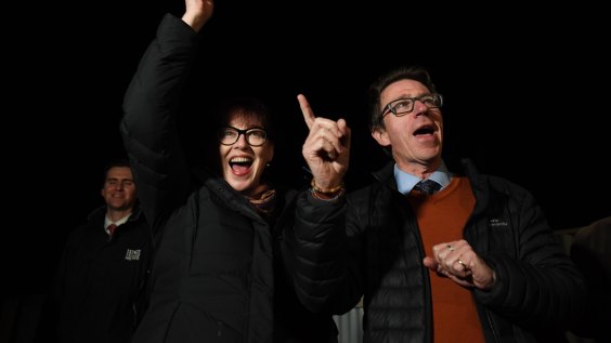 Joe McGirr and his wife, Kerin Fielding, celebrate as victory looked imminent in Wagga Wagga on Saturday.