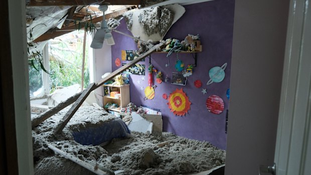 The storm tore off the roof and walls of Jason Whitnker's house in Belgrave.