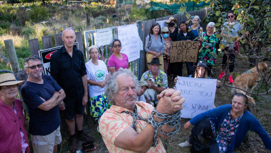 Inner-city gardeners chained themselves to the fences of their beloved veggie patches in an attempt to stop the planned demolition of the Collingwood Children’s Farm community gardens on Monday morning.