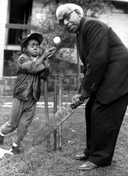 Sir Douglas Nicholls playing cricket.