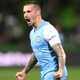 Jamie Maclaren celebrates a key goal for City.