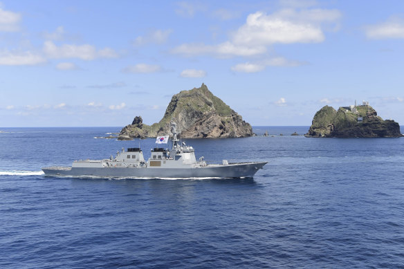 South Korean Navy's Aegis destroyer, King Sejong the Great, sails during the drill near the islets.