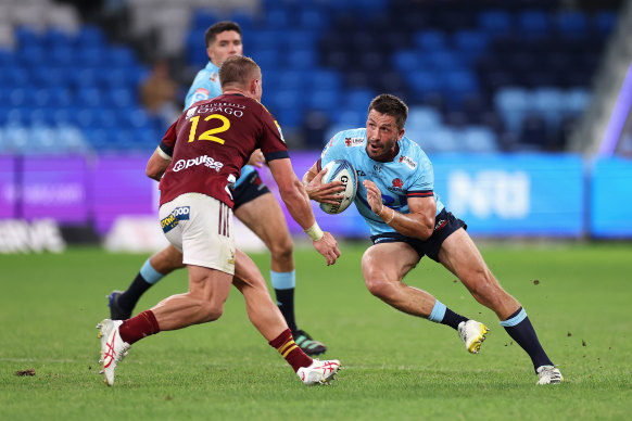 Jake Gordon runs against the Highlanders.